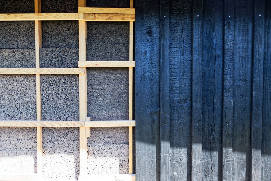 Cork insulation with charred timber cadding
